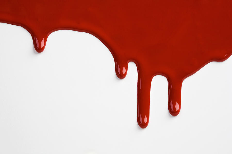 Red paint dripping down a white wall Photograph by Caspar Benson