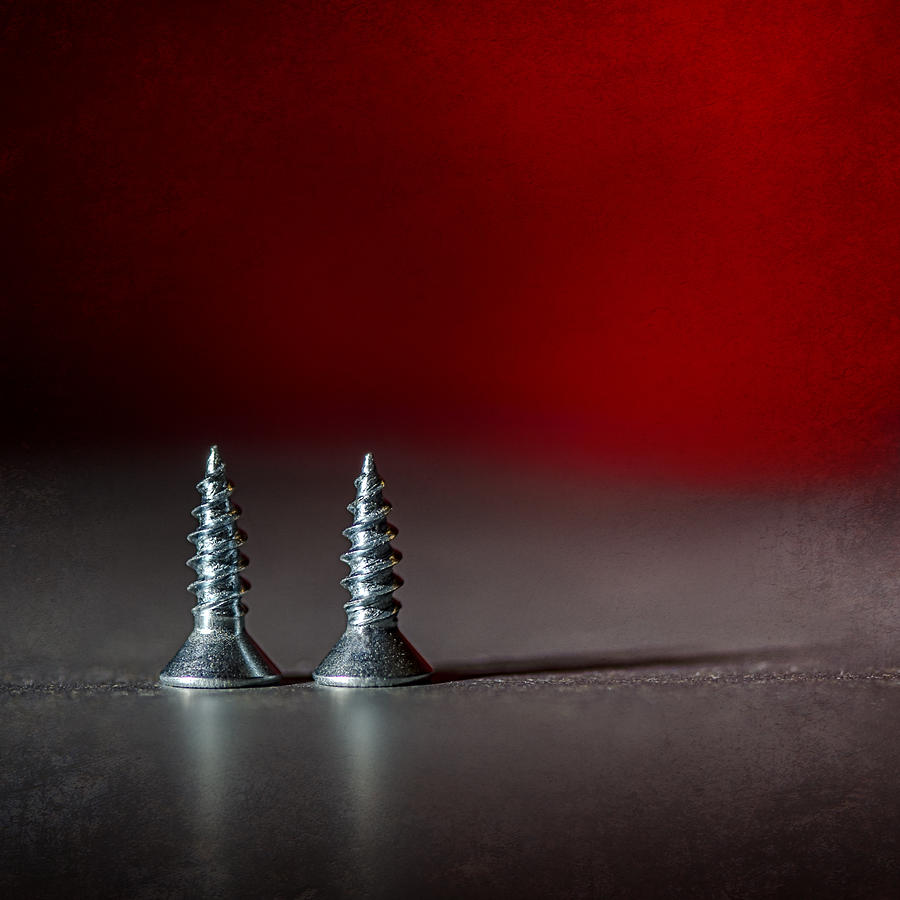 Red Screws Photograph by Sandra Parlow