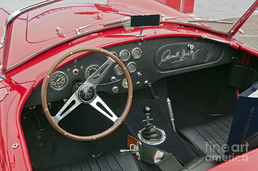 Red Shelby Motors Roadster signed by Carroll Shelby Photograph by David Zanzinger