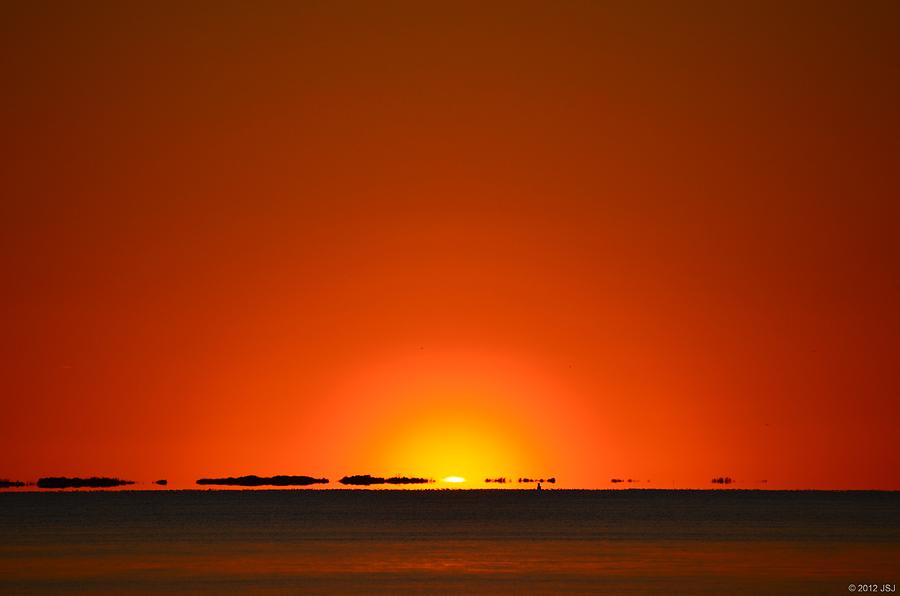 Red Sunset with Superior Mirage on Santa Rosa Sound Photograph by Jeff at JSJ Photography
