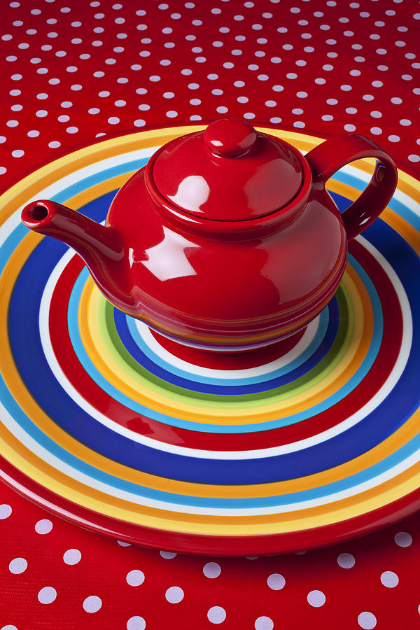 Teapot Photograph - Red teapot on circle plate  by Garry Gay