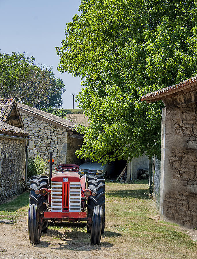 Red Tractor on a French Farm Photograph by Georgia Clare