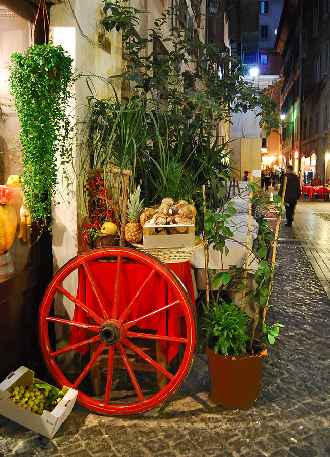 Red Wheel in Rome Photograph by Caroline Stella