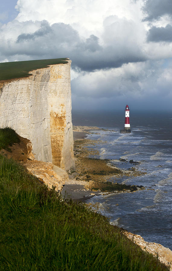 White cliffs and red-white striped lightouse in the sea Photograph by Jaroslaw Blaminsky