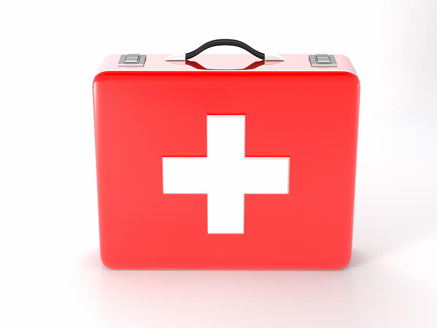Red with white cross first aid kit on white background Photograph by Hh5800