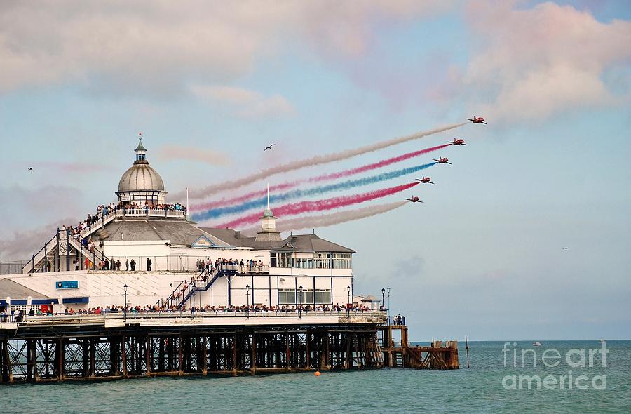 Reds over Eastbourne pier Photograph by David Fowler