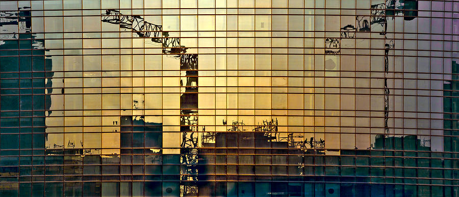 Architecture Photograph - Reflected cranes at sunset by Roberto Pagani