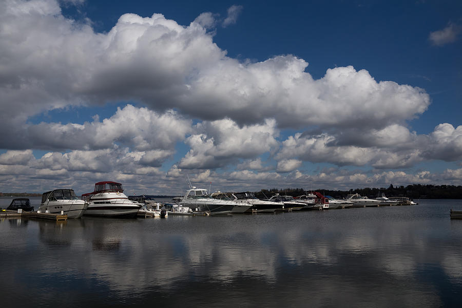 Reflecting on Boats and Clouds - Port Perry Marina Photograph by Georgia Mizuleva
