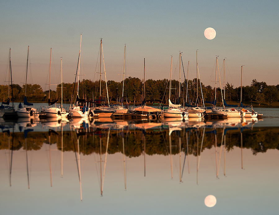 Reflecting sailboats sundown moon Photograph by Randall Branham