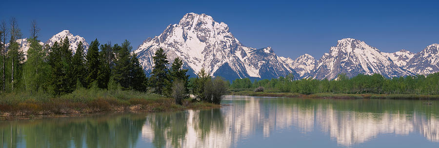 Grand Teton National Park Photograph - Reflection Of A Mountain Range by Panoramic Images