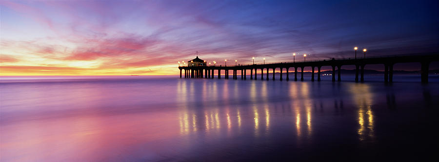 Reflection Of A Pier In Water Photograph by Panoramic Images