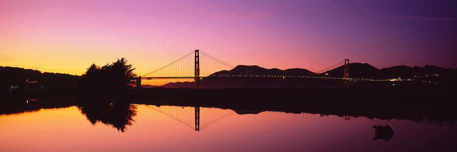 Golden Gate Bridge Photograph - Reflection Of A Suspension Bridge On by Panoramic Images