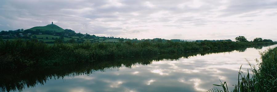 Nature Photograph - Reflection Of Clouds In The River by Panoramic Images