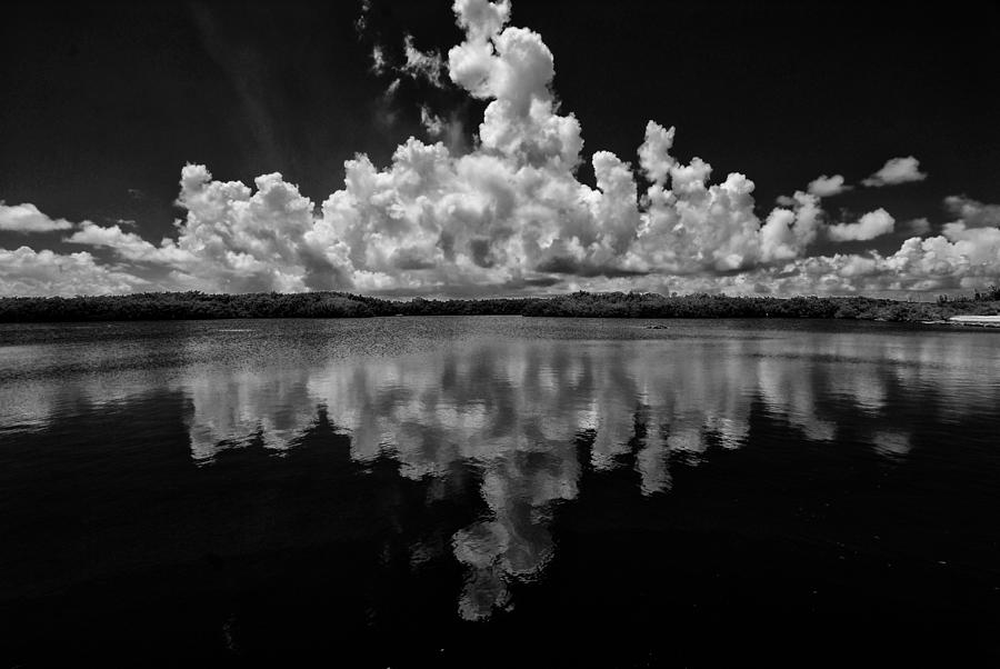 Reflection Of Clouds Photograph by Kevin Cable