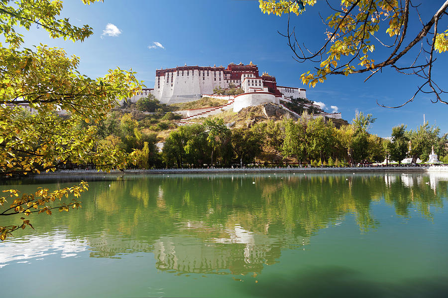 Reflection Of Potala Palace In Lhasa Photograph by Loonger