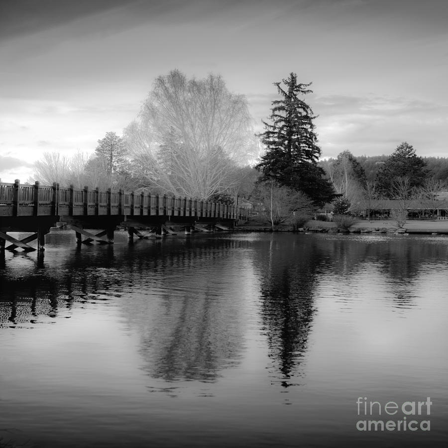 Reflection Of Scenic Wooden Bridge And Trees on The Deschutes Photograph by Jerry Cowart