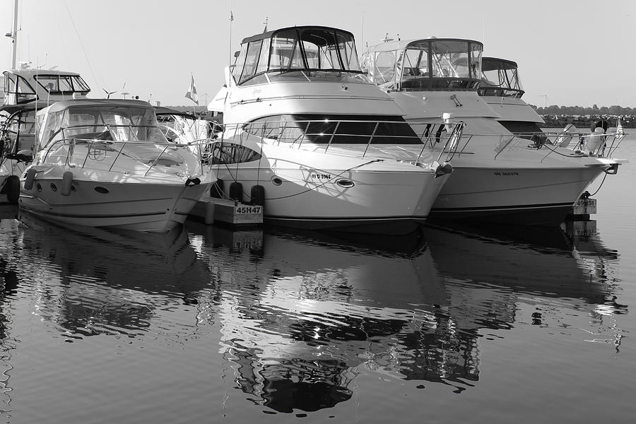 Reflections at Confederation Harbour Photograph by Jim Vance