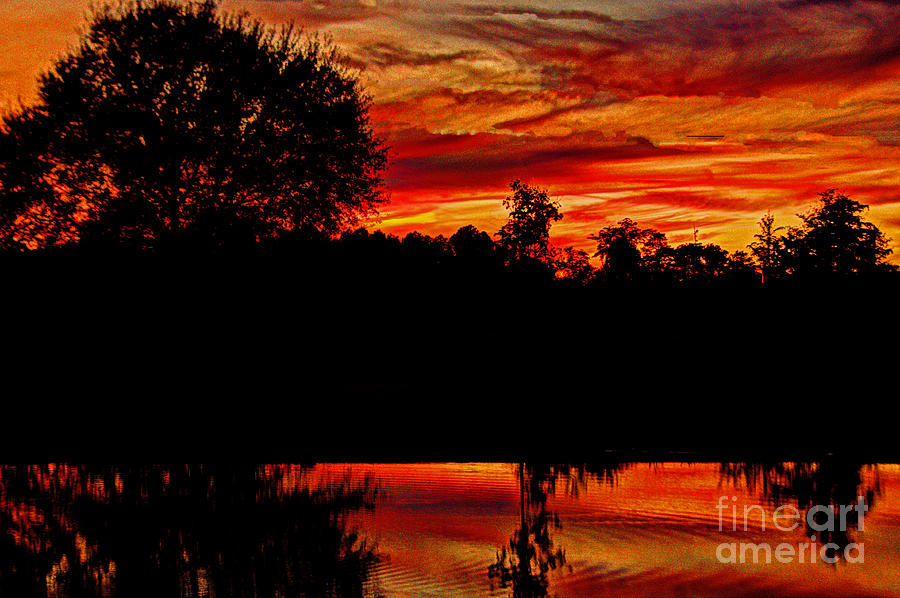 Reflections of a Sunset Photograph by Dave Bosse