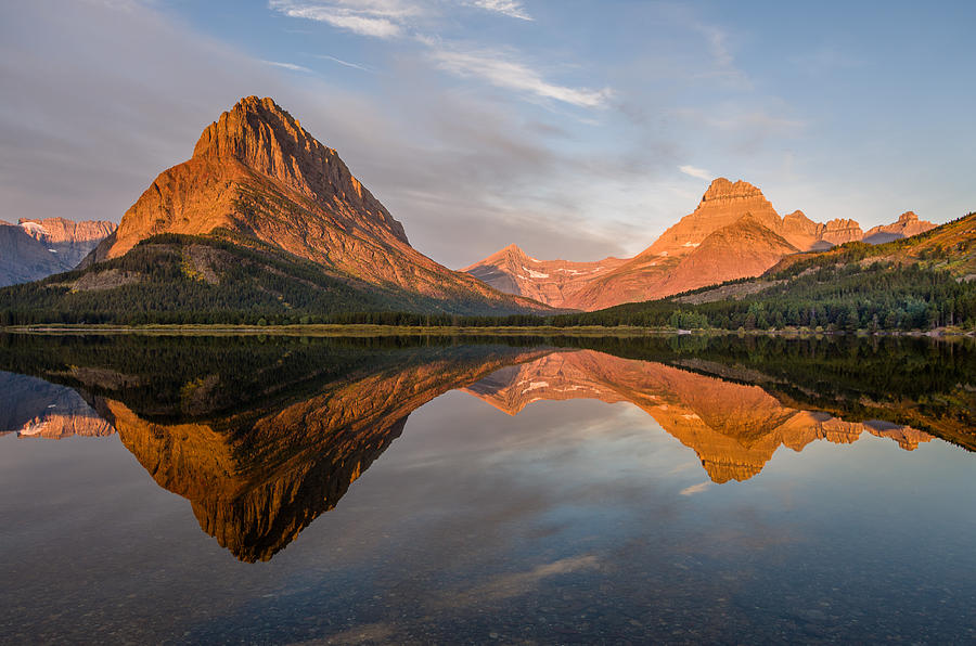 Reflections on Grinnell Point and Mount Wilbur Photograph by Greg Nyquist