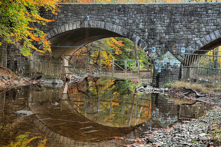 Reflections Under A Stone Bridge  Photograph by Adam Jewell