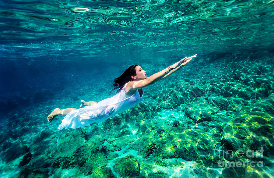 Refreshing swimming underwater Photograph by Anna Om