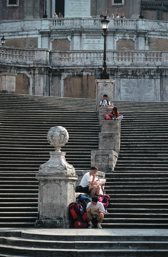 Relaxing at the Spanish Steps in Rome Photograph by Tom Wurl