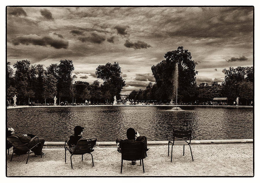 Relaxing in Jardin des Tuileries Photograph by Lenny Carter