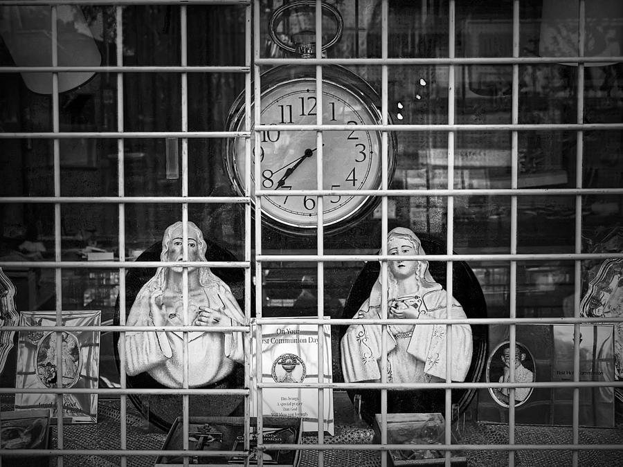 Religious Figurines with Clock Photograph by Randall Nyhof