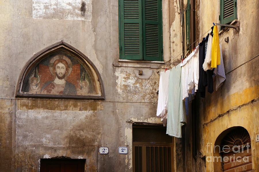 Religious Icon And Laundry Photograph by Holly C. Freeman