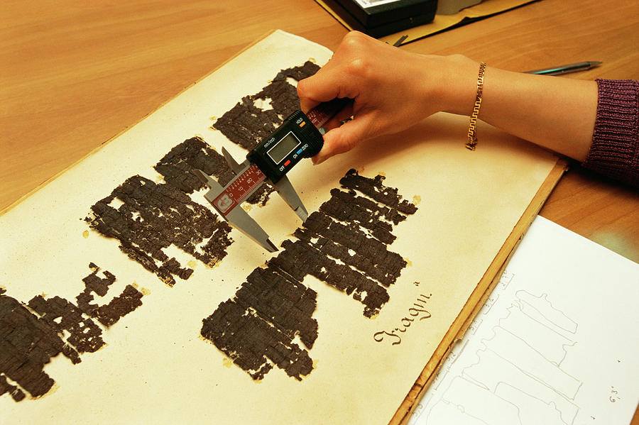 Researcher Measuring Papyrus Scrolls Photograph by Pasquale Sorrentino/science Photo Library