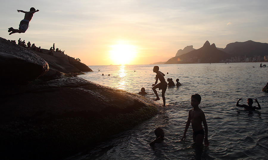Residents Crowd Beaches During Rio De Photograph by Mario Tama