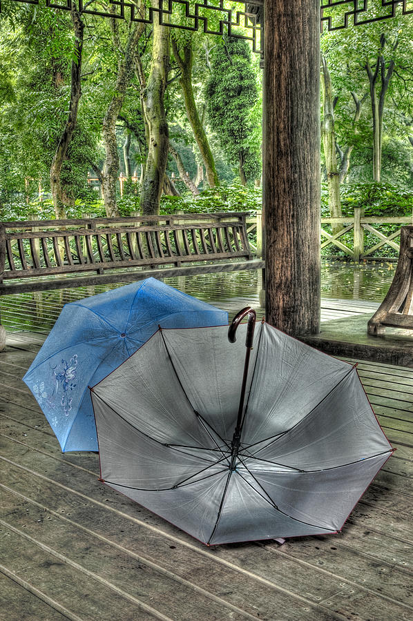 Respite from the Rain 1 Hangzhou China Photograph by Rob Huntley