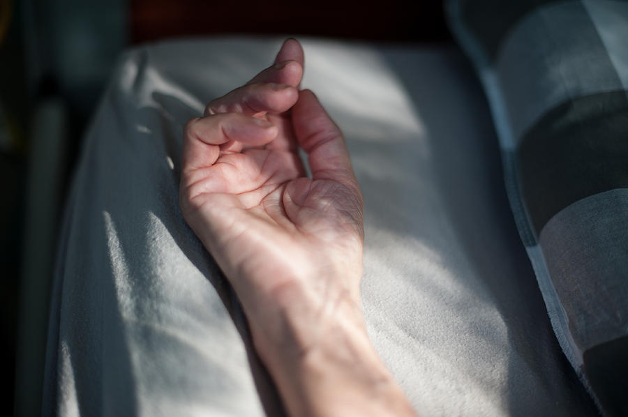 Resting hand in bed Photograph by Lucy Lambriex Resting hand in bed Photograph by Lucy Lambriex