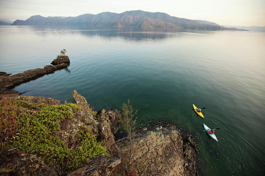 Sports Photograph - Retired Couple Kayak On A Beautiful by Patrick Orton