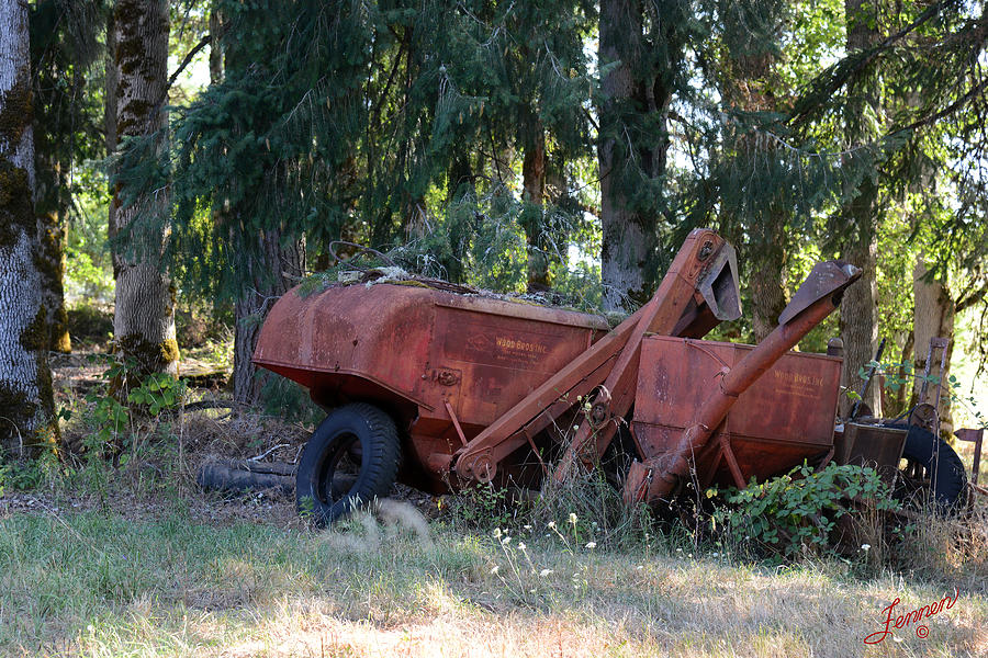 Retired Farm Equipment Photograph by Charles Fennen