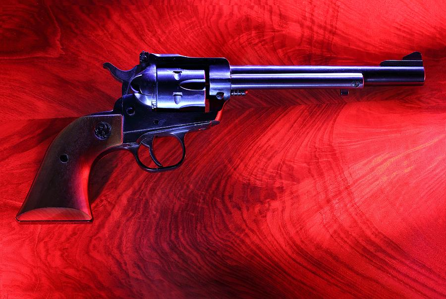 Revolver on Red Photograph by David Andersen