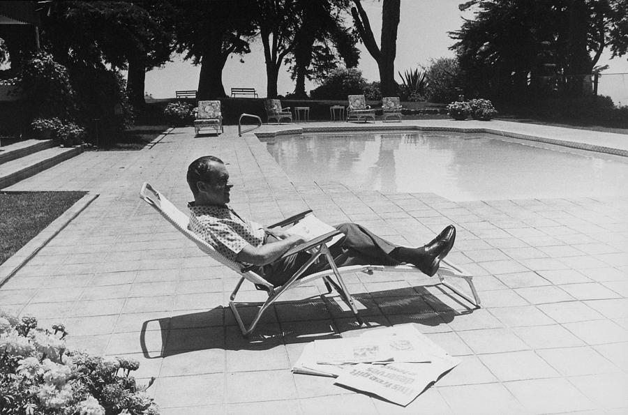 Richard Nixon Reading Newspapers While Photograph by Everett