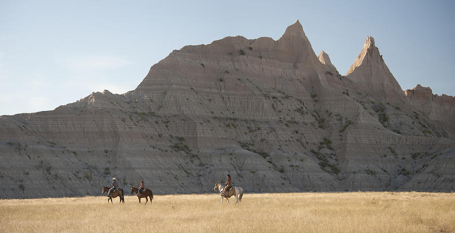 Usa Photograph - Riders in the Badlands by Christian Heeb