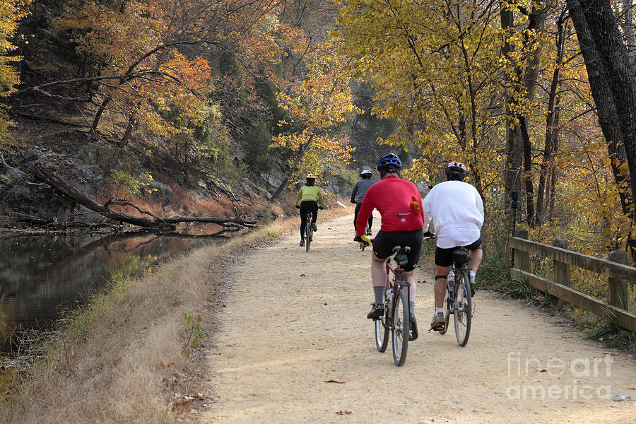 Riding on the C and O Canal Towpath in Autumn Photograph by William Kuta