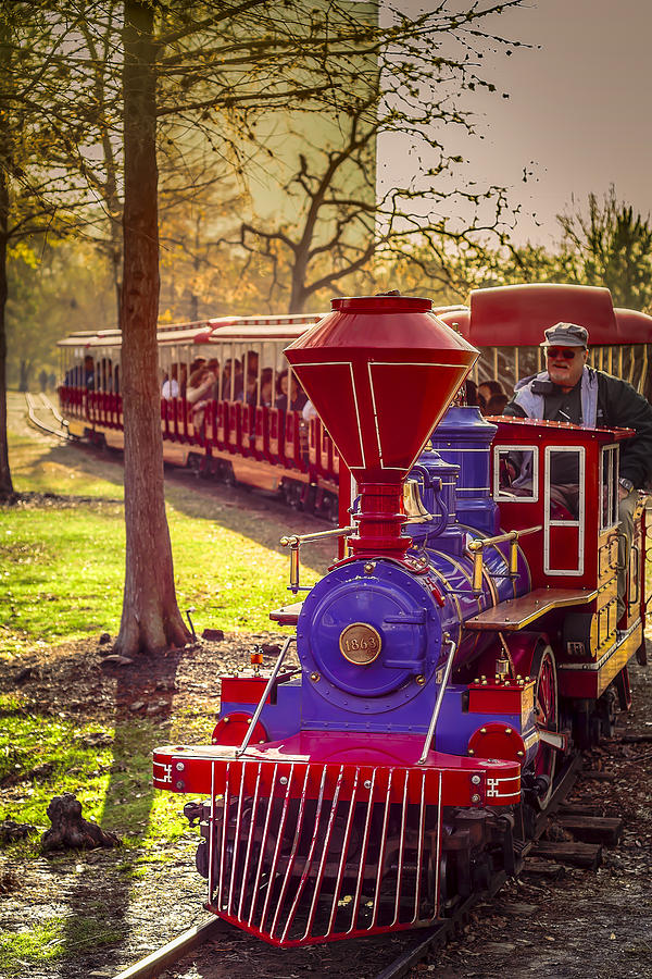 Riding out of the Sunset on the Hermann Park Train Photograph by David Morefield