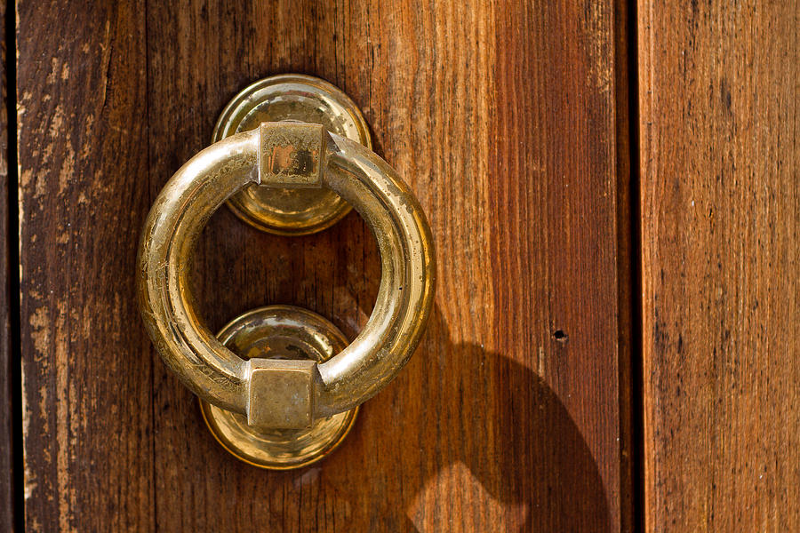 Ring on the door Photograph by Raimond Klavins