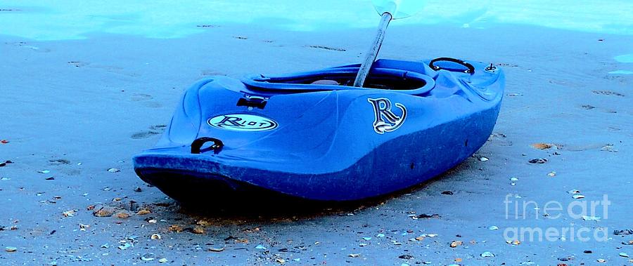 A Blue Kayak Named Riot Photograph by Bob Sample