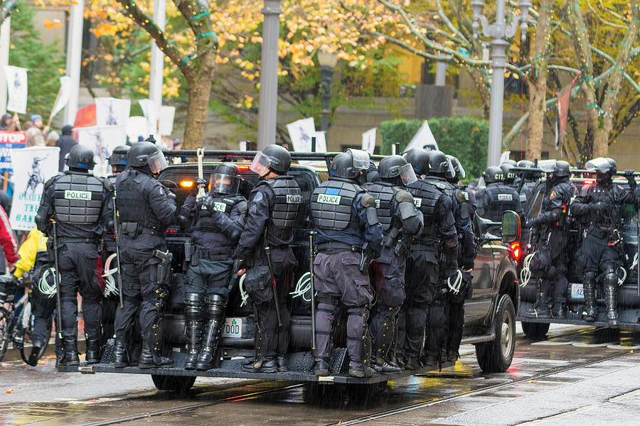 Riot Police On Vehicle To Control Occupy Portland Protest Crowd 