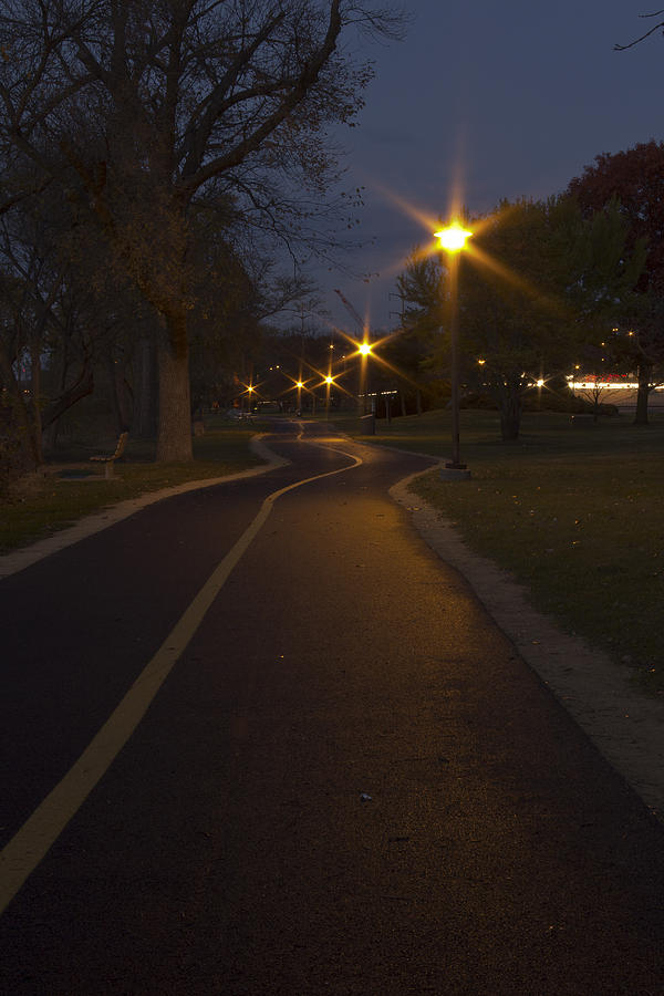 River Walkway at Night Photograph by Jim Baker