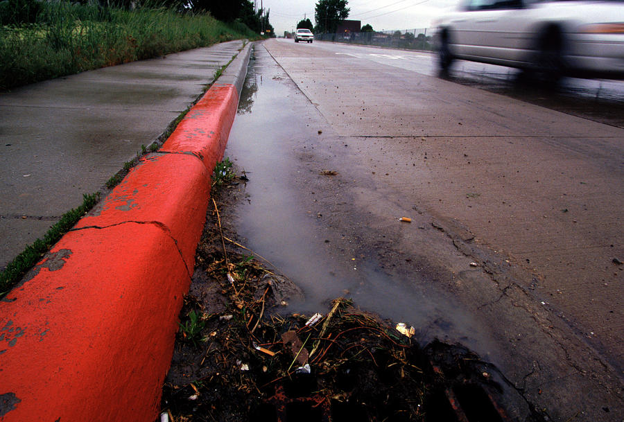 Automobile Photograph - Road Curb Runoff In Storm Drain, Murry by Peter Essick