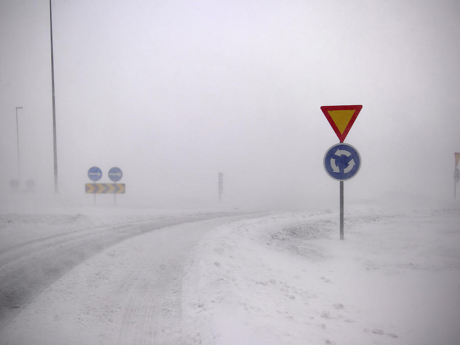 Road Signs In Snowy Landscape Photograph by Kmm Productions