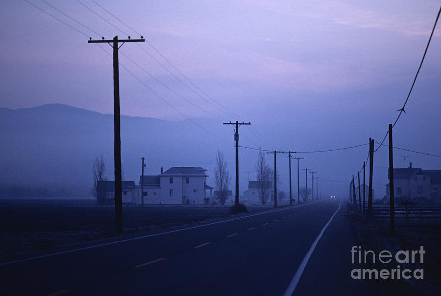 Road through farm land Photograph by Jim Corwin