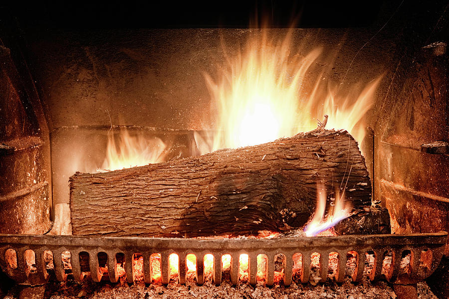 Roaring Log Fire In Cast Iron Hearth Photograph by Nicolasmccomber