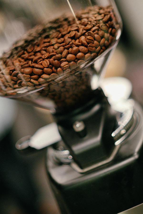 Roasted Coffee Beans In A Grinding Mill Photograph by Matthias Lambrecht