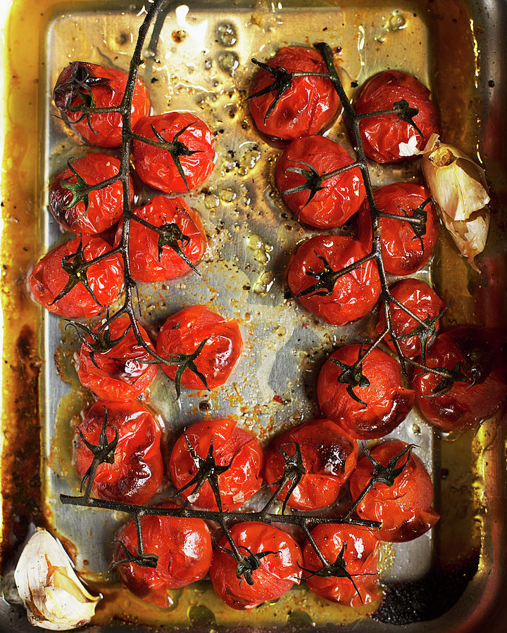 Still Life Photograph - Roasted Vine Tomatoes In Roasting Tin by Ross Woodhall